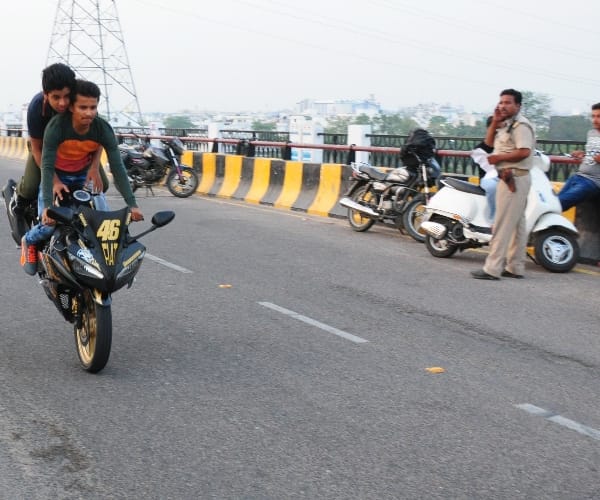 Bikers tease police men.