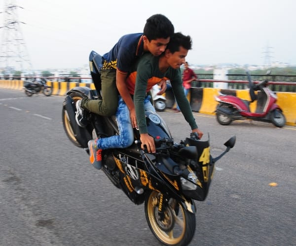 Bikers tease police men.