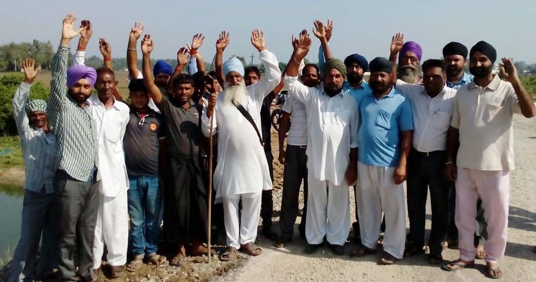 Mustafabad, of Manakot Villagers display