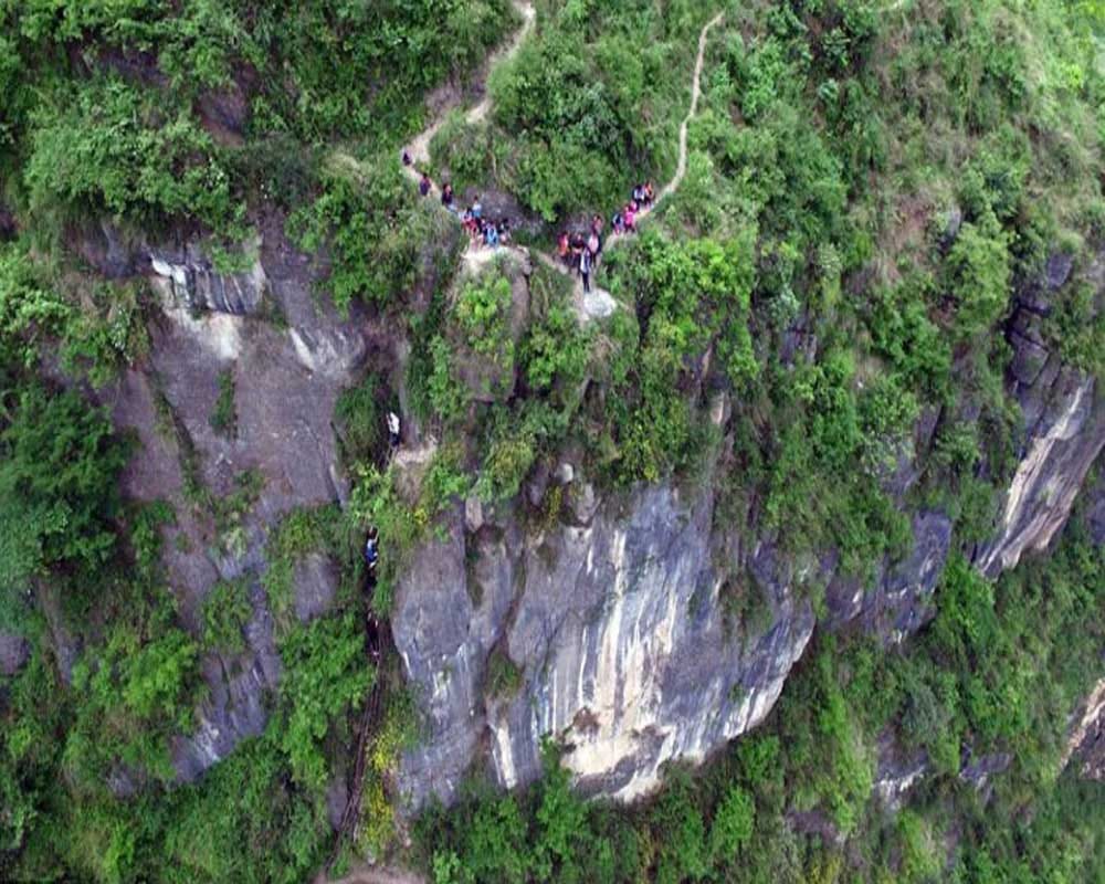 Students Climb Thousands Foot Cliff To Attend School
