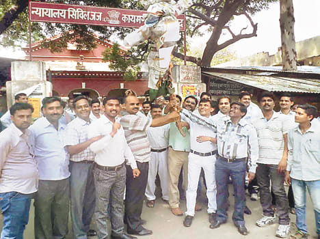 lawyers burned an effigy of Rajkumar and SP