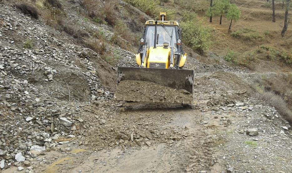 JCB clear road debris