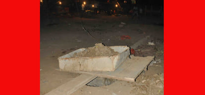 Speaking on the phone woman died after falling into manhole, 