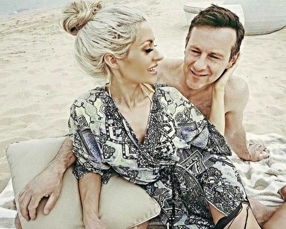 a mother of five children with figure like a model