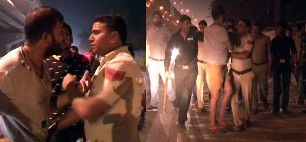 Police caught drunk in public, going around with a bottle of wine on the street youth