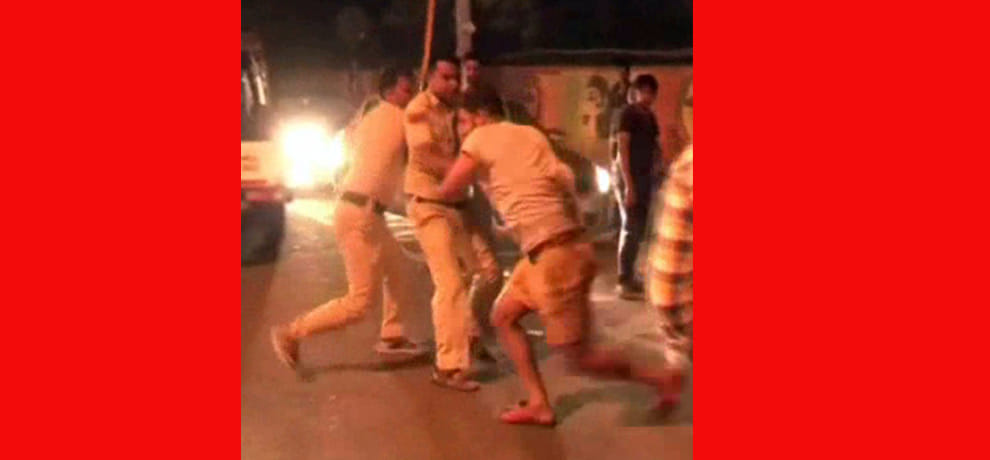 Police caught drunk in public, going around with a bottle of wine on the street youth