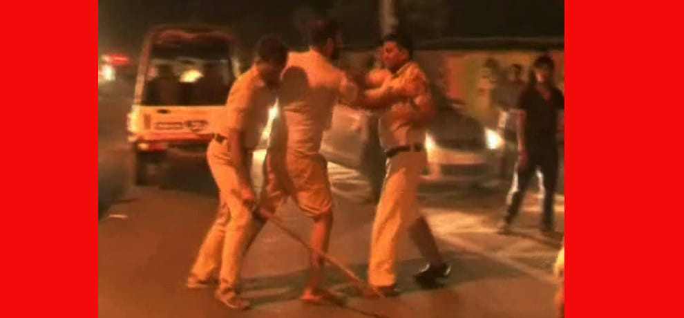 Police caught drunk in public, going around with a bottle of wine on the street youth