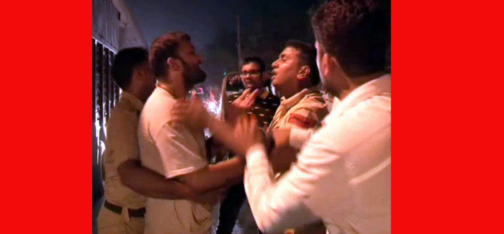 Police caught drunk in public, going around with a bottle of wine on the street youth