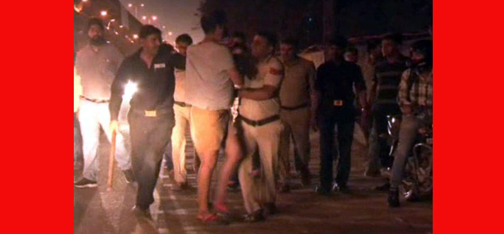 Police caught drunk in public, going around with a bottle of wine on the street youth