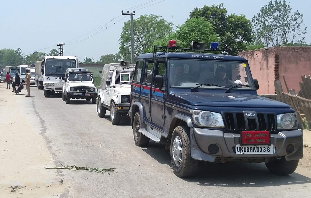 few shops opend in landhaura, police flag marched