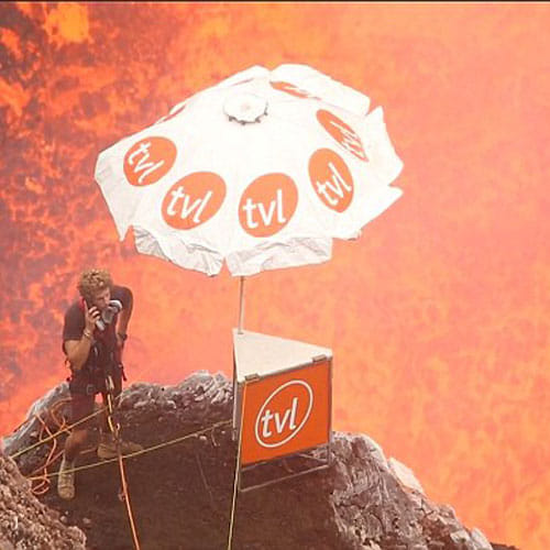 this man inside a volcano chatting on his mobile 