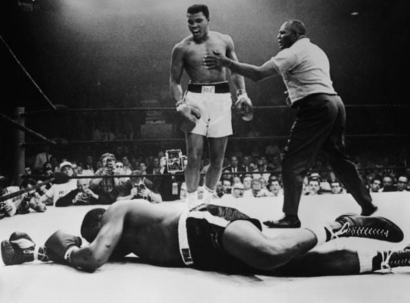 Muhammad Ali who threw olympic medal in river