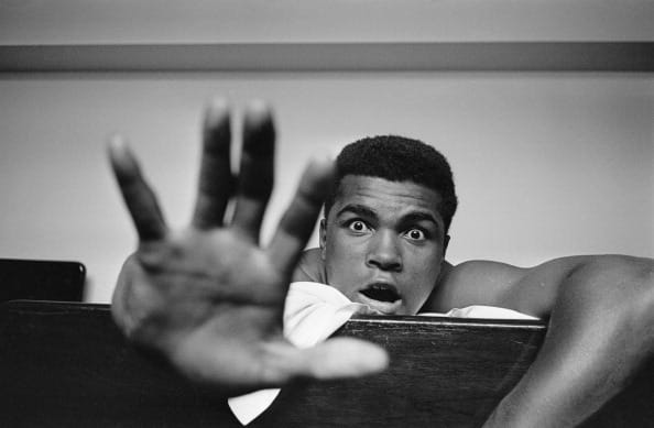 Muhammad Ali who threw olympic medal in river