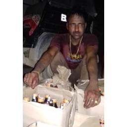 youth arrested with 83 bottal wine
