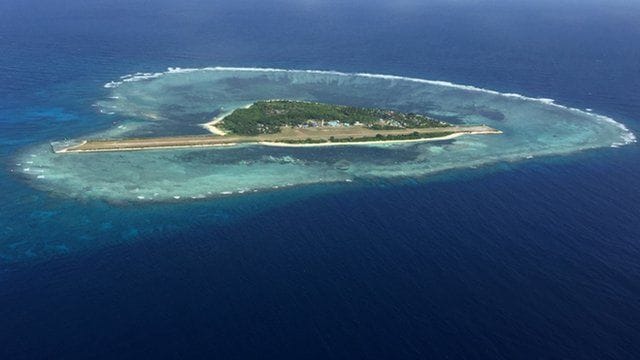 China warns america says does not fear 'trouble'