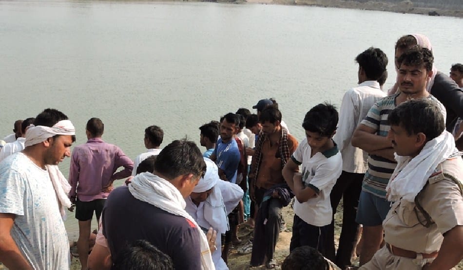 including 2 brothers 3 children, immersed in canal in jind, Weeds