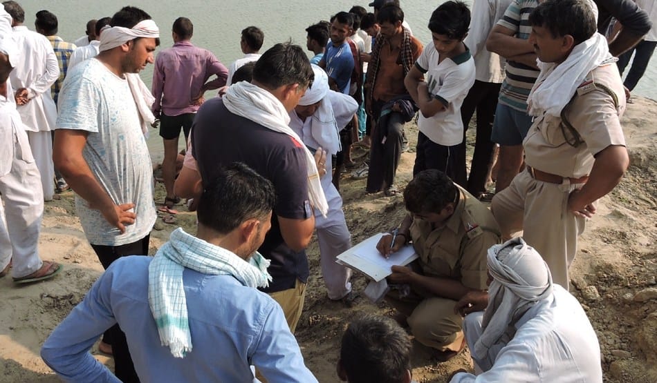 including 2 brothers 3 children, immersed in canal in jind, Weeds