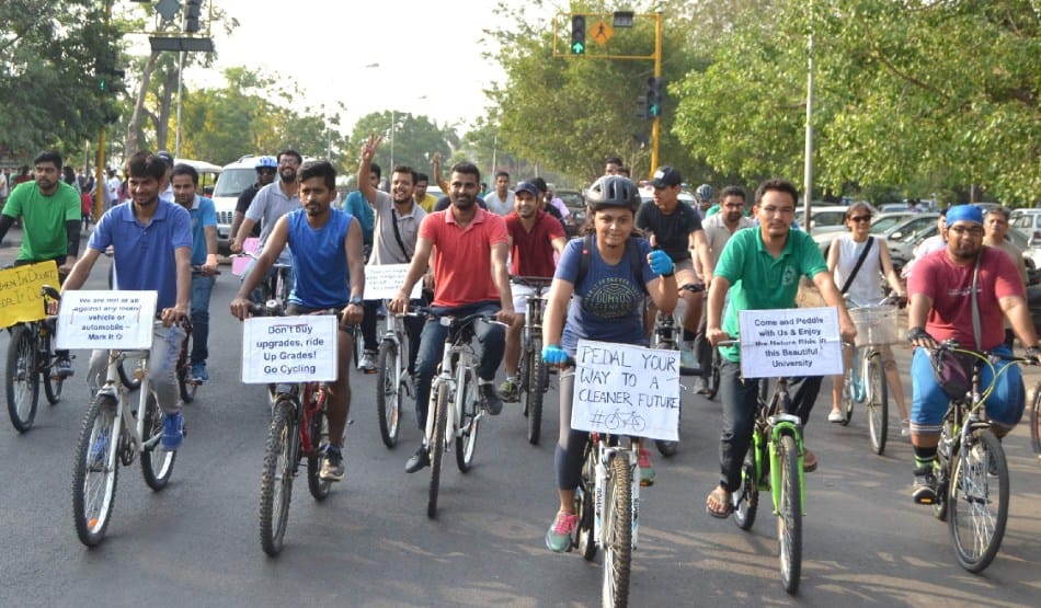 environmental message by bicycle from rally at Capitol Complex