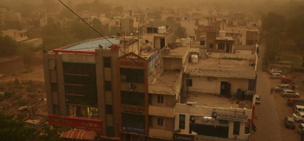 relief by drizzle after dust storm in evening