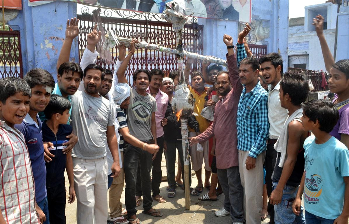 Burnt effigies of the government on price rise