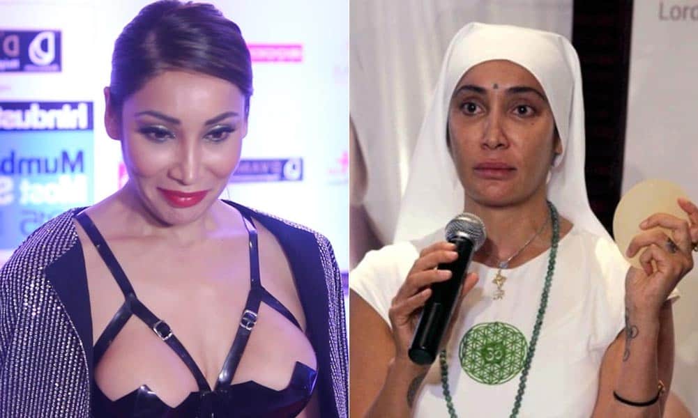 Sofia Hayat shows her breast implants at a press conference