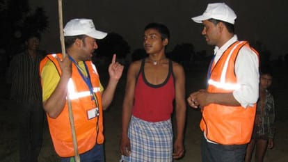  They take turns hitting the open defecation CT