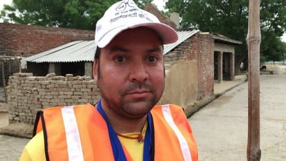  They take turns hitting the open defecation CT