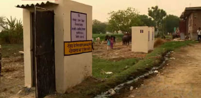  They take turns hitting the open defecation CT