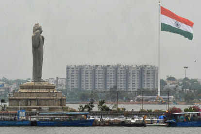 Wind damages country's largest tricolour.