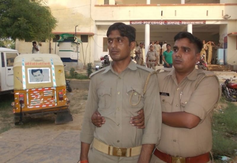 Liquor recovered from the house, the woman in custody