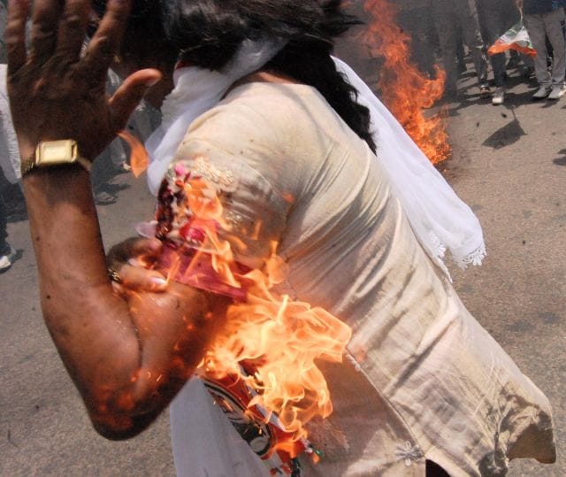 Congress workers burnt the effigy of Modi blew