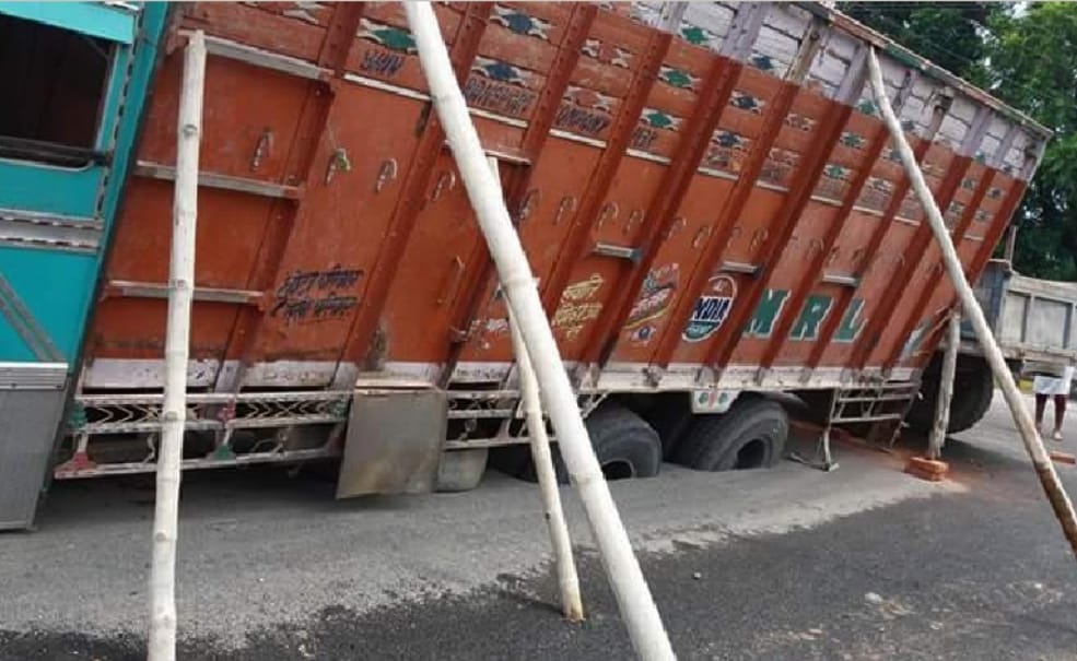 truck sunken on the road