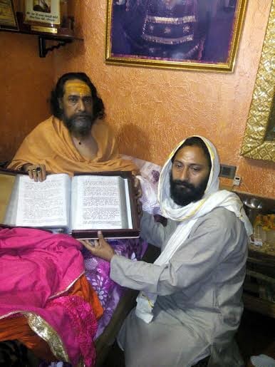 weird people, rohtak pandit karamvir kaushik wrote geeta, quran with blood