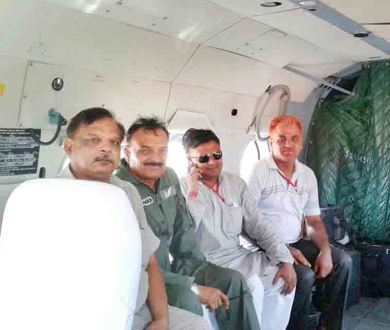 taking selfi in army helicopter