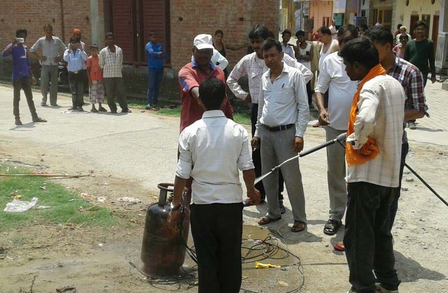 Gas cylinder fire, stirring