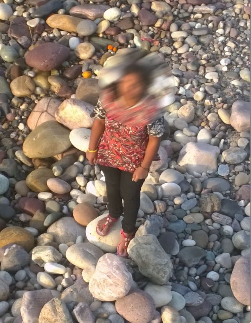 girl jumped into river fell into island.