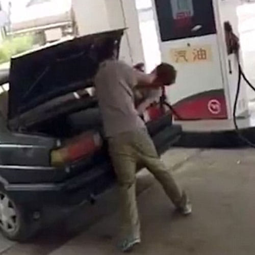 chinese man beating her wife