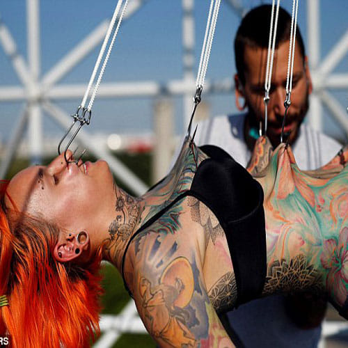 this girl fitted iron hooks in her body