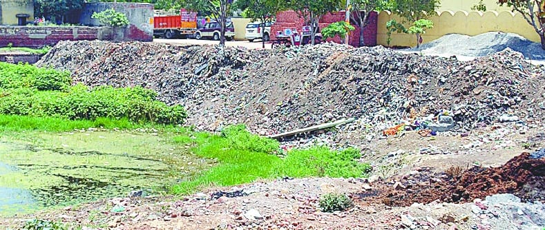 Made pond garbage dumping area