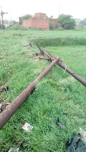Fall storm poles, city and village immersed in the dark