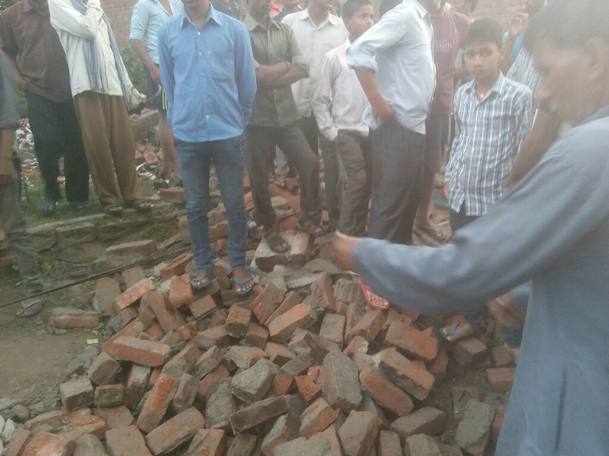 wall fell on man, died