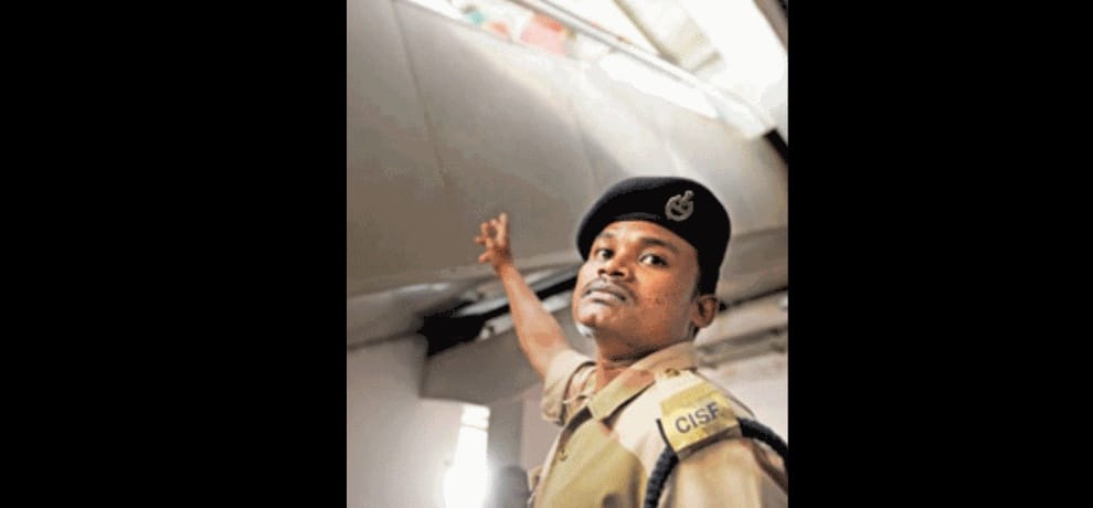 cisf personnel saves a girl falling from escalator handrail