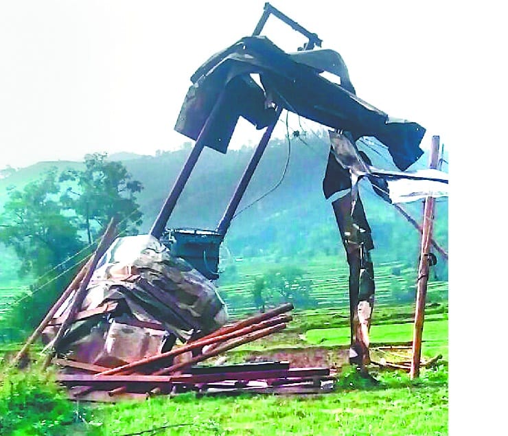 Uprooted from rain and gale electric pole