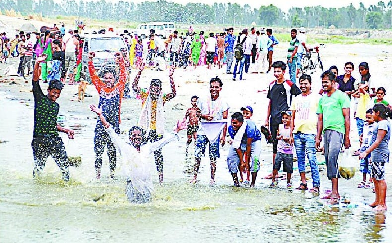 Devotees descended on the river