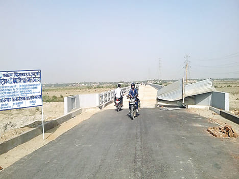 Vehicle ran over the bridge before opening Priyr