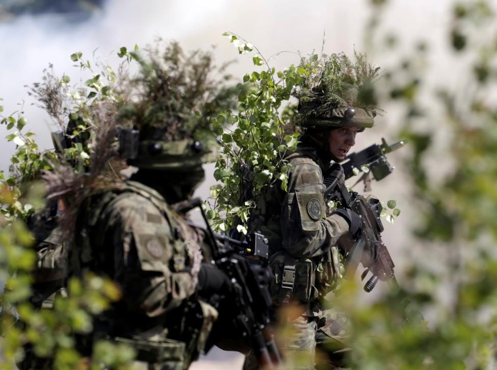 NATO FLEXES MILITARY MUSCLE