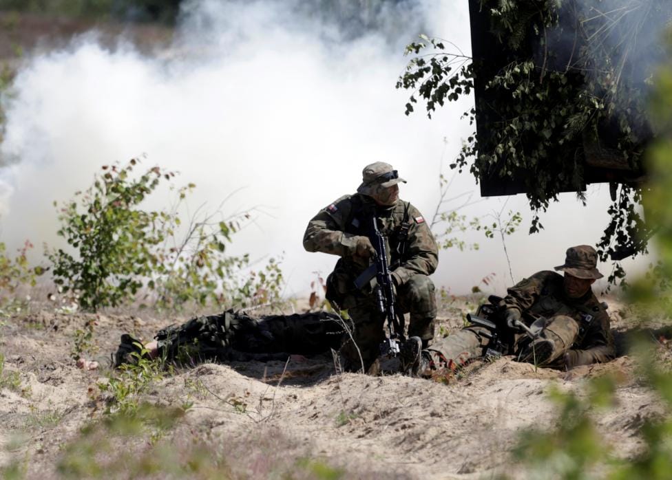 NATO FLEXES MILITARY MUSCLE