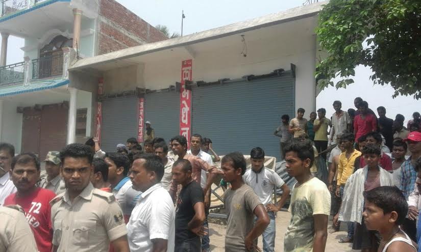 Iron shot businessman accused