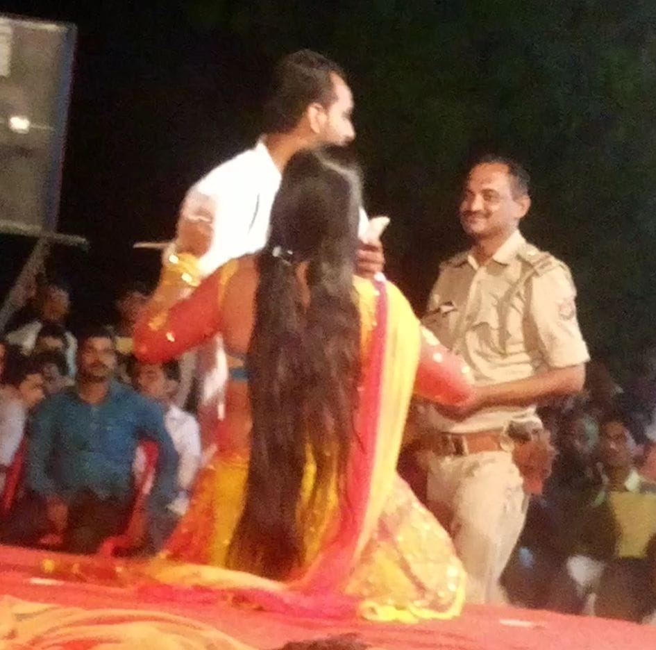 Inspector blow money on the dancers suspended