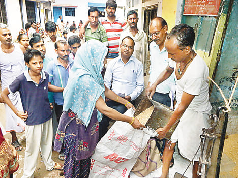 Officials distribute ration